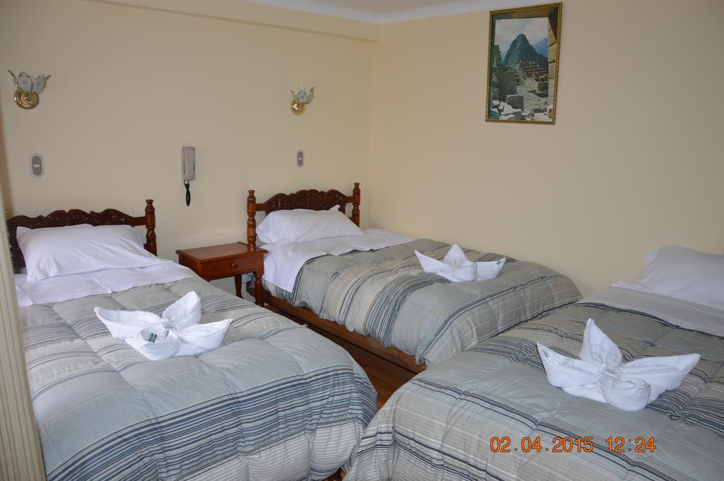 Hostal Huaynapata Куско Стая снимка
